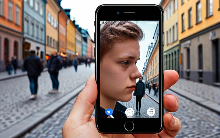 **A young person looking at their reflection in a smartphone screen, which distorts their face to look like filtered, "perfected" social media versions of themselves. The background is a blurred urban street in Stockholm.**